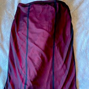 Red skirt with black sheet overlay